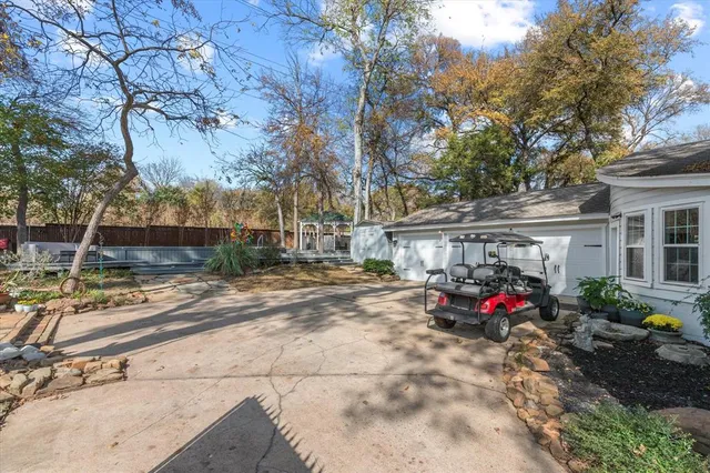 a view of street with parked cars