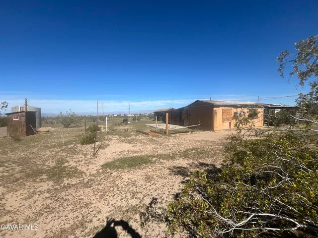 a view of a lake with a beach