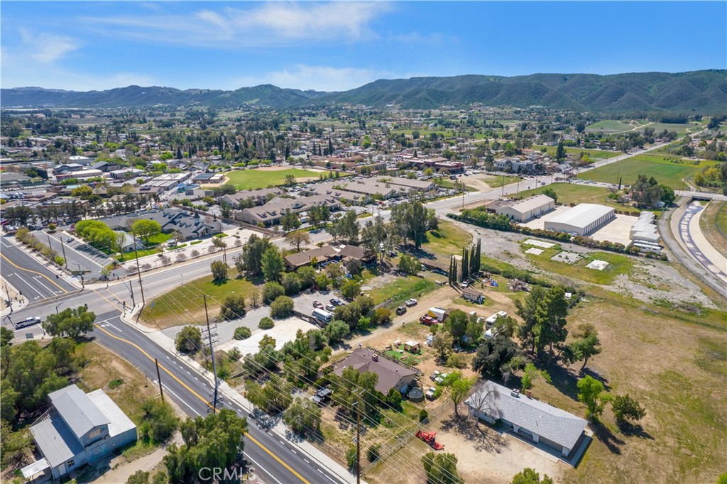 24585 Adams Avenue Murrieta, CA 92562 - Photo 2 of 29 an aerial view of residential houses with outdoor space