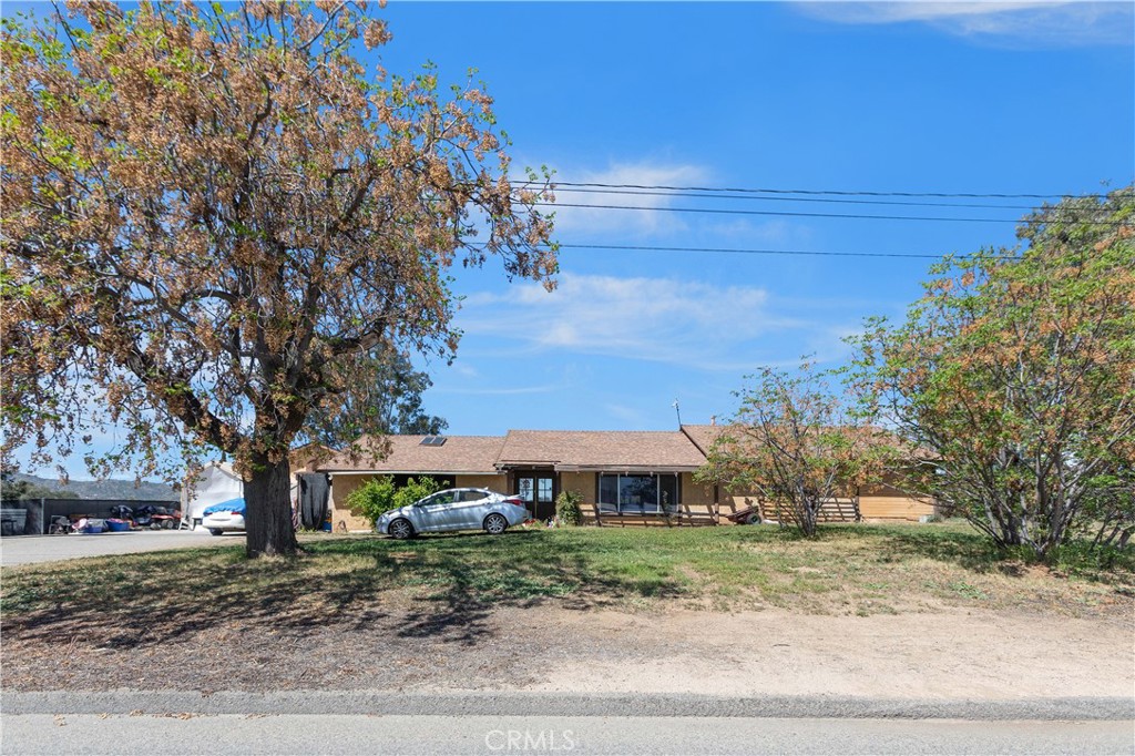 24585 Adams Avenue Murrieta, CA 92562 - Photo 24 of 29 a front view of a house with a yard