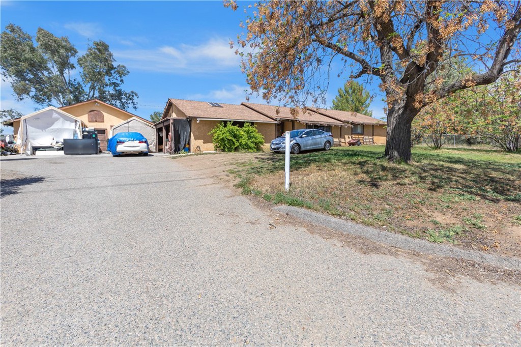 24585 Adams Avenue Murrieta, CA 92562 - Photo 25 of 29 a view of street with houses