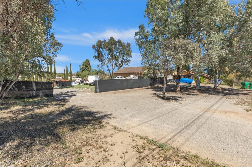 24585 Adams Avenue Murrieta, CA 92562 - Photo 26 of 29 a view of a park with swings and slides