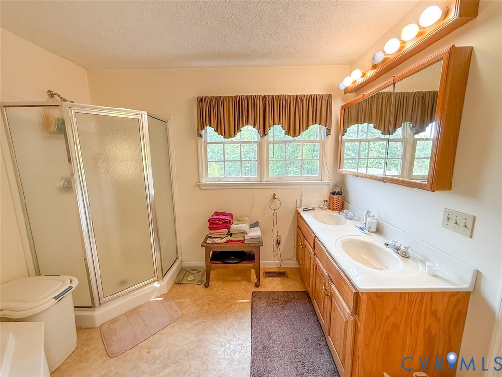 45 Gallion Town Road Victoria, VA 23974 - Photo 15 of 41 a bathroom with a sink a toilet and a tub