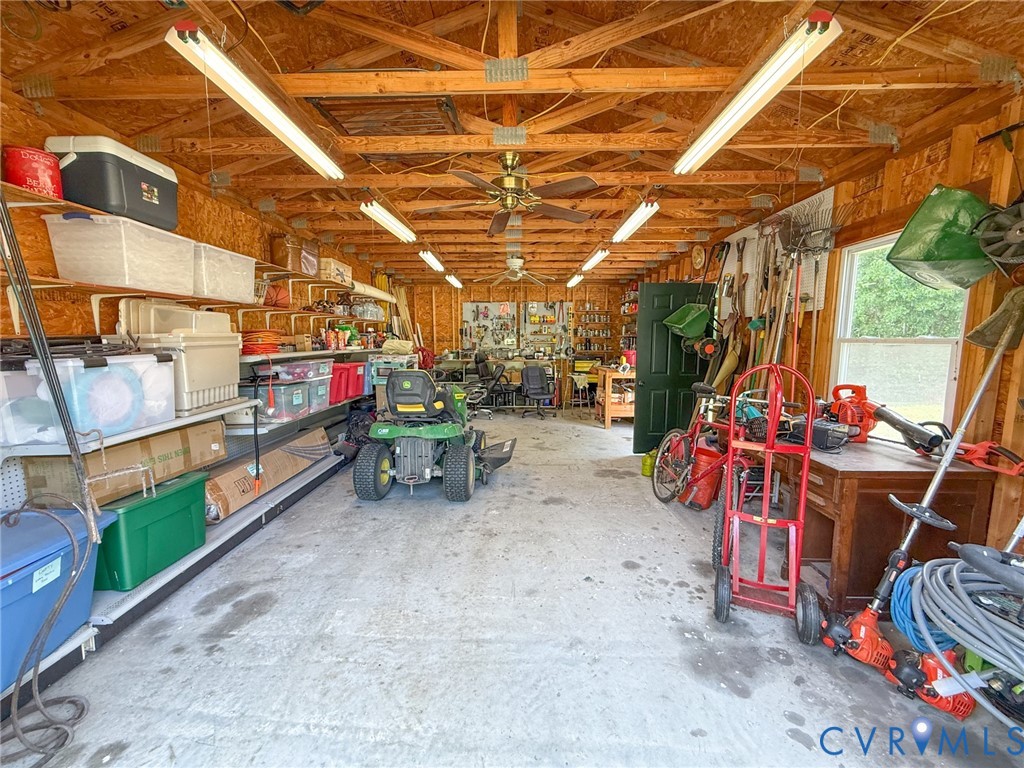 45 Gallion Town Road Victoria, VA 23974 - Photo 39 of 41 a view of a garage with a table and chairs