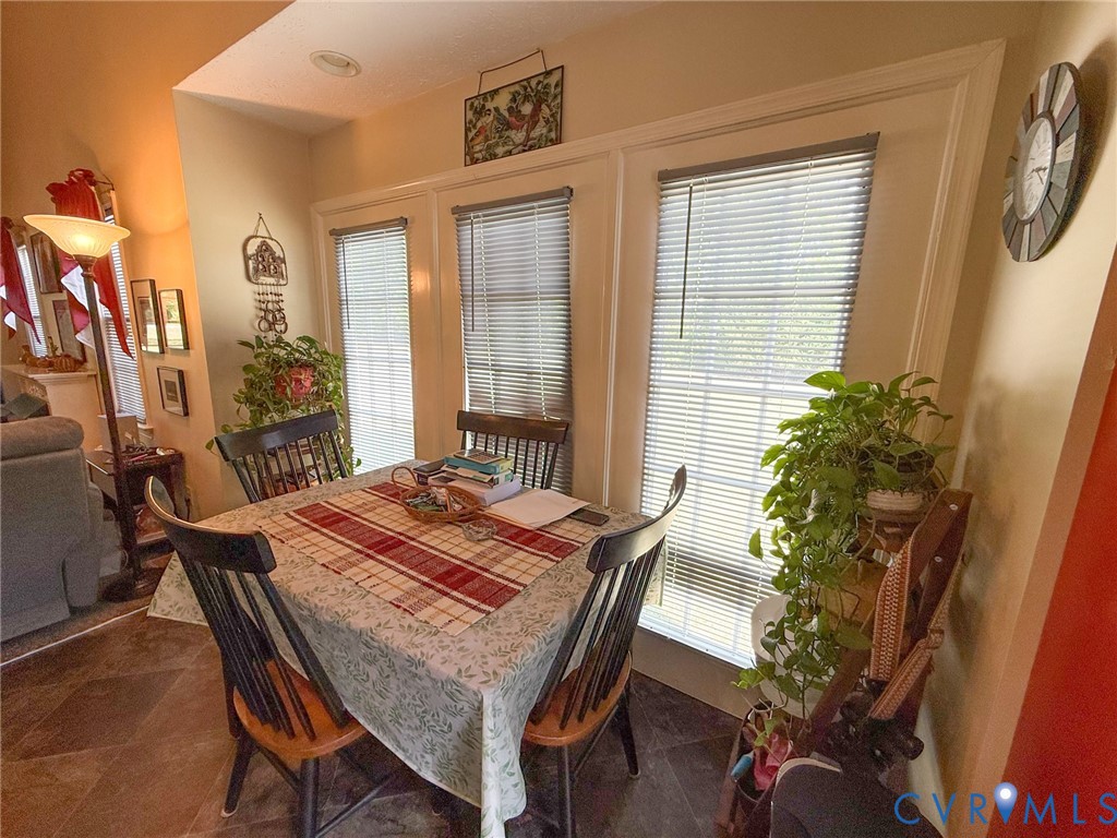 45 Gallion Town Road Victoria, VA 23974 - Photo 8 of 41 a view of a dining room with furniture and a potted plant