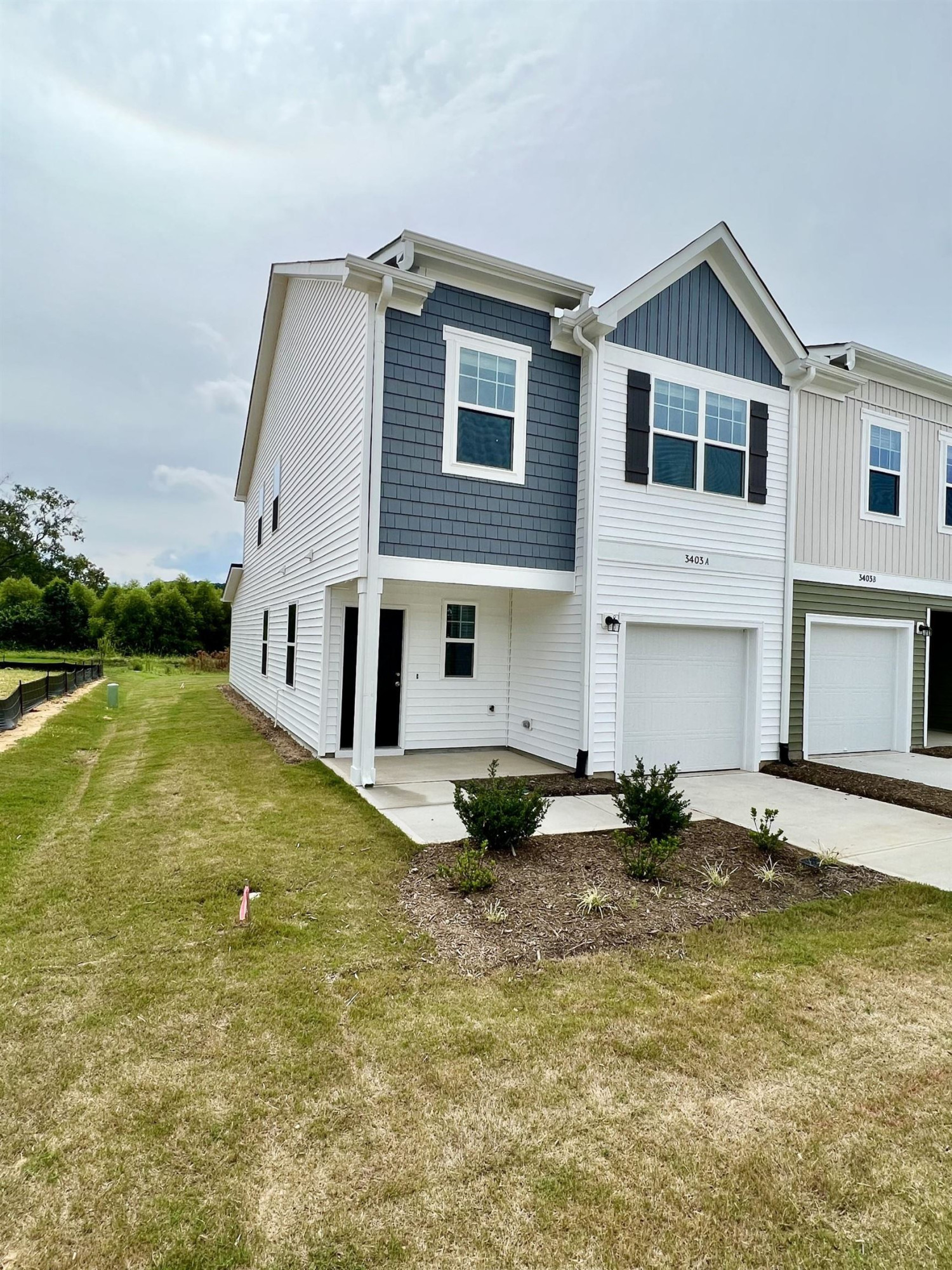 3403 A Walker Wilson, NC 27893 - Photo 4 of 23 a front view of a house with garden