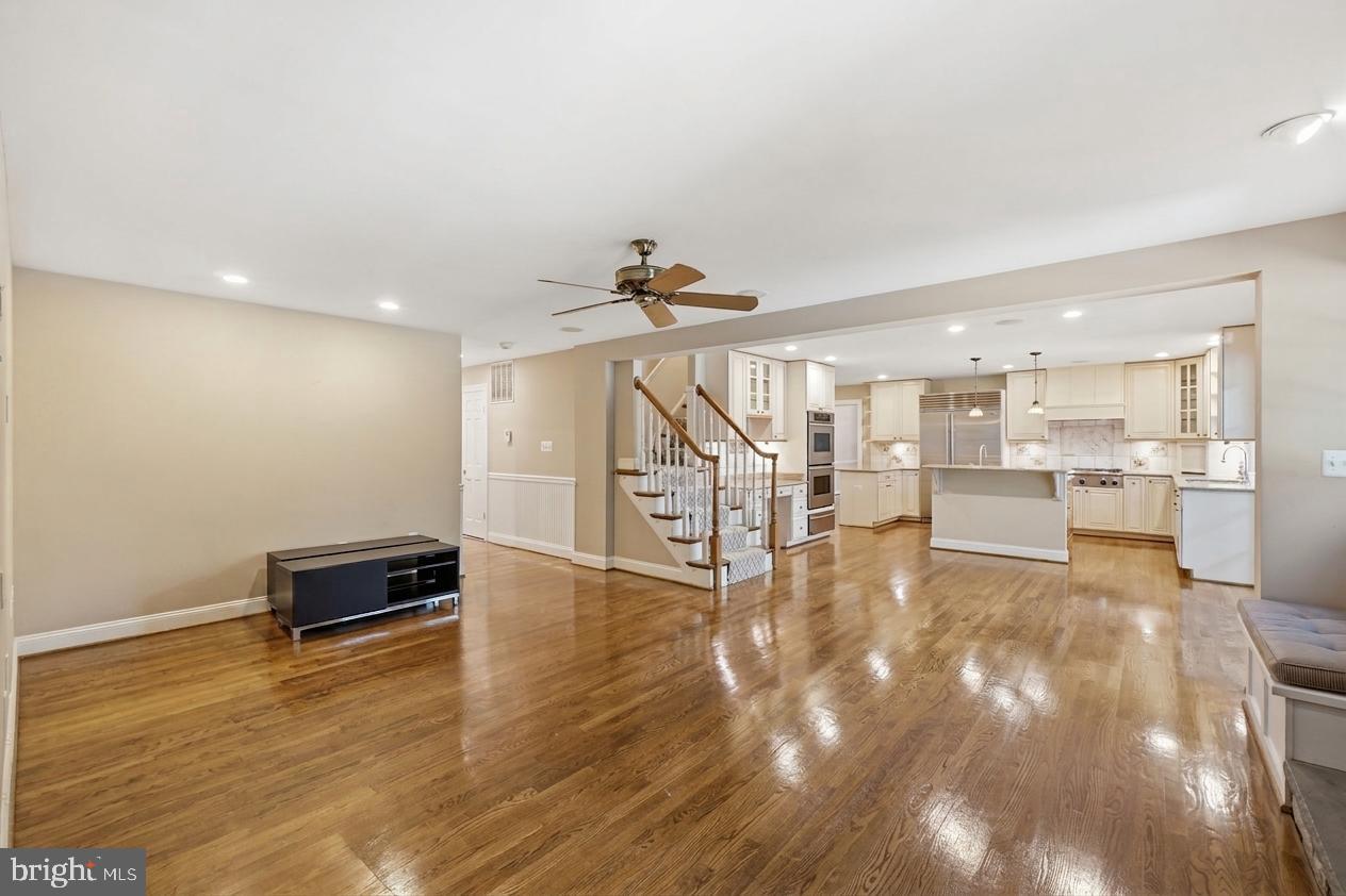 9904 Hall Road Potomac, MD 20854 - Photo 12 of 37 a view of kitchen with furniture and wooden floor