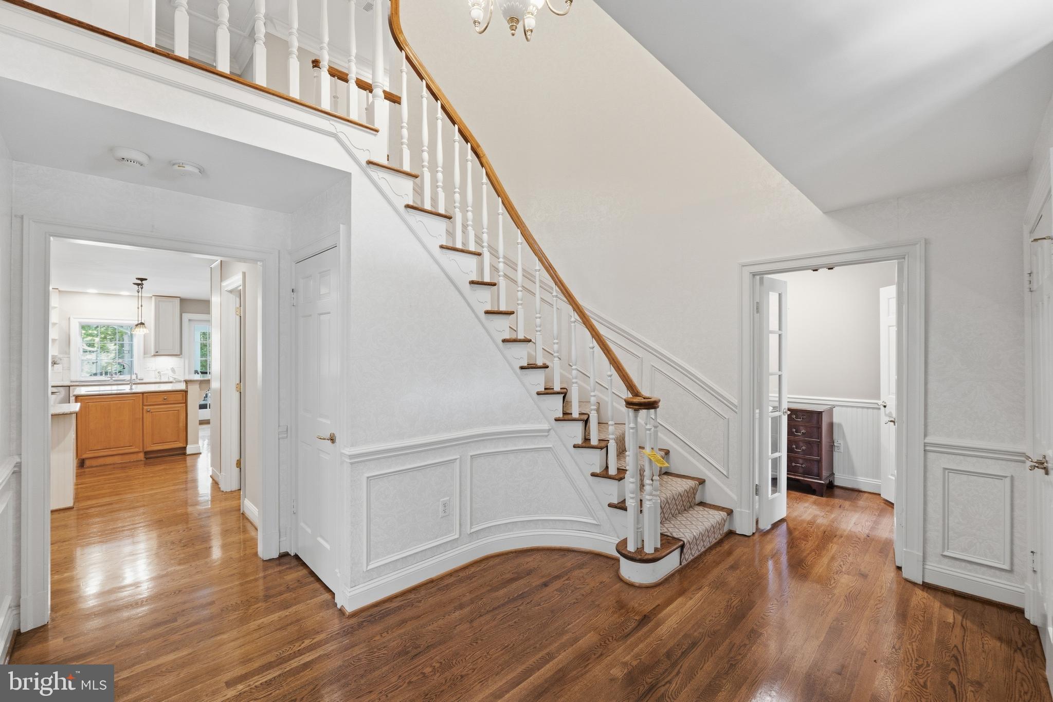 9904 Hall Road Potomac, MD 20854 - Photo 2 of 37 a view of entryway and hall with wooden floor