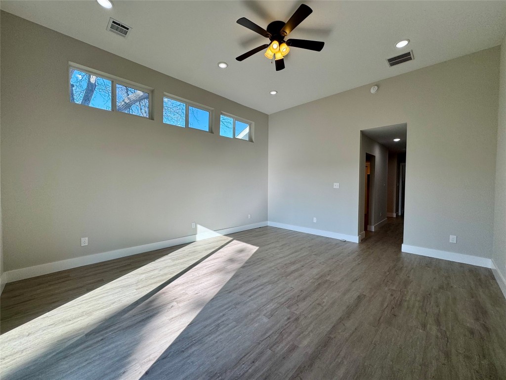 813 Central Avenue Elgin, TX 78621 - Photo 15 of 26 a view of empty room with wooden floor