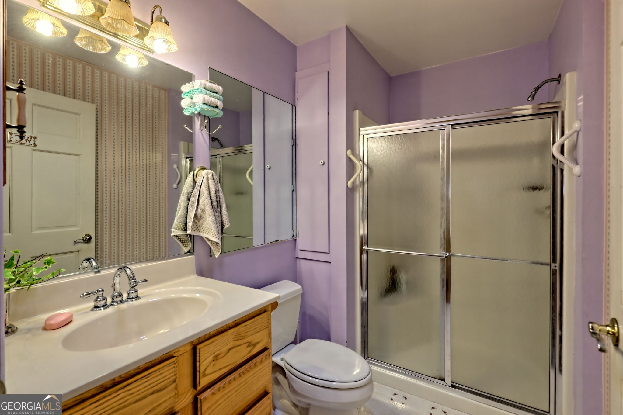 7829 Dillard Road Scaly Mountain, NC 28775 - Photo 35 of 97 a bathroom with a sink toilet and shower