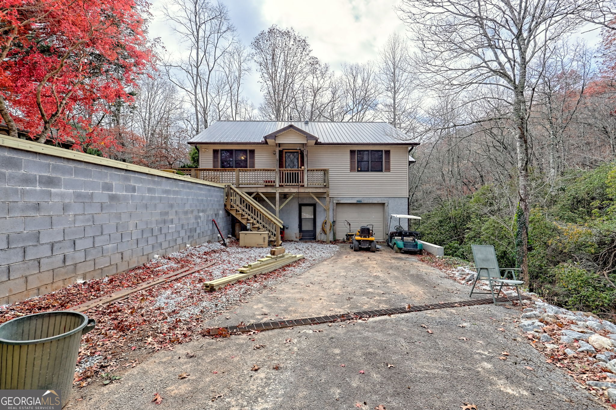 7829 Dillard Road Scaly Mountain, NC 28775 - Photo 56 of 97 a front view of a house with garden