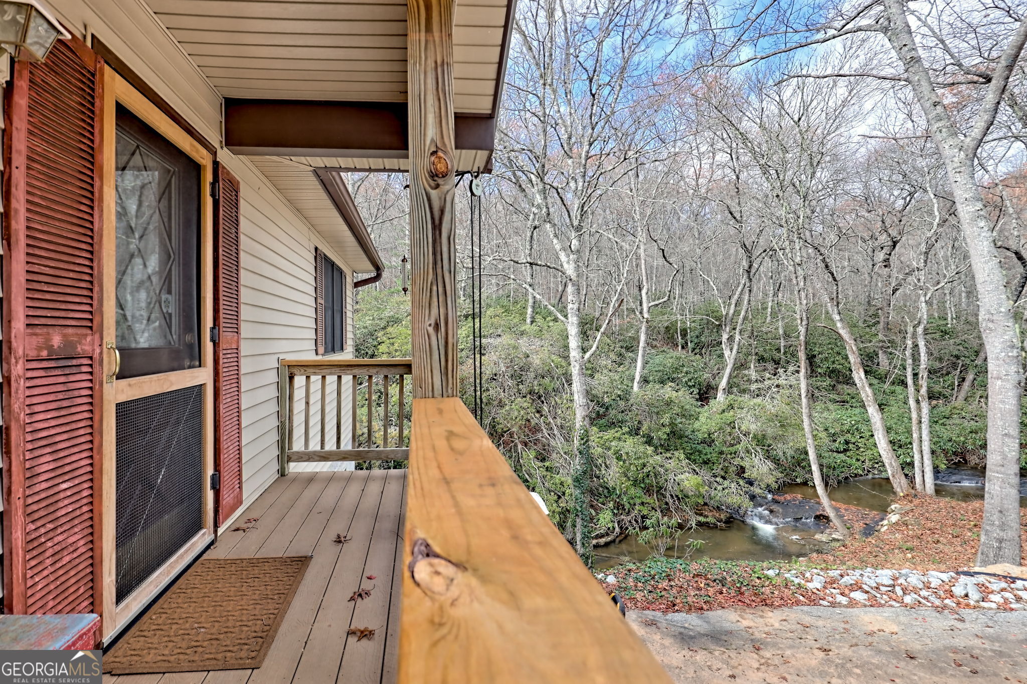 7829 Dillard Road Scaly Mountain, NC 28775 - Photo 9 of 97 a view of balcony with wooden floor and fence