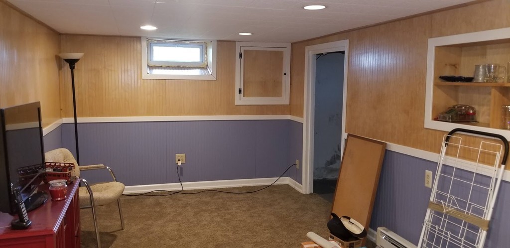 43 Sargon Street Springfield, MA 01104 - Photo 17 of 25 a view of a hallway with workspace