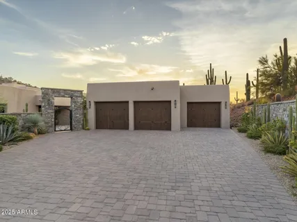 a spacious bathroom with a sink and a large mirror
