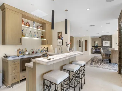 a living room with couch and a large window