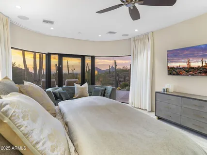 a view of a house with backyard and garden