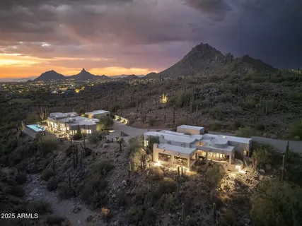 a view of a lake in middle of the forest