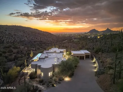 a view of a road with a building in the background