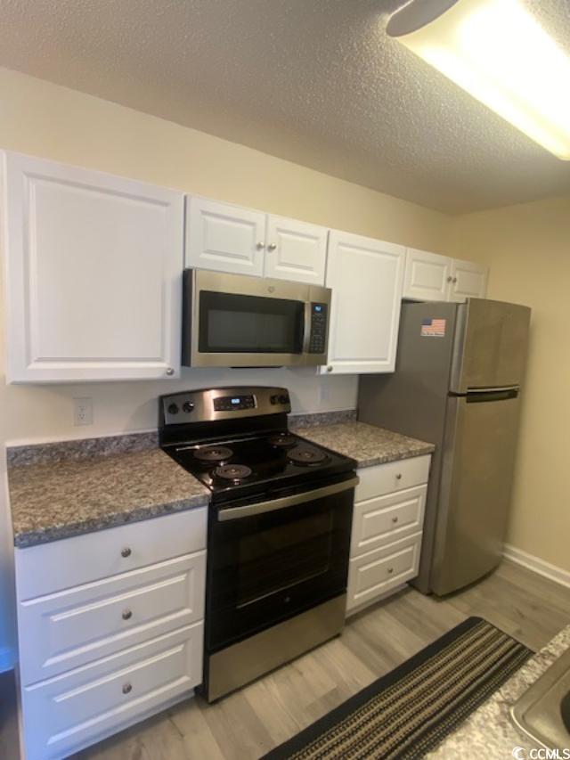 8925 Duckview Drive, Unit H Surfside Beach, SC 29575 - Photo 2 of 15