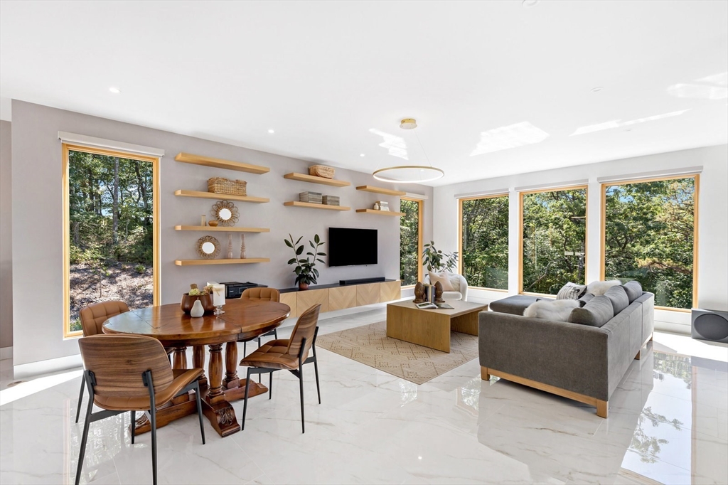 1924R State Road Plymouth, MA 02360 - Photo 9 of 41 a living room with furniture and a large window