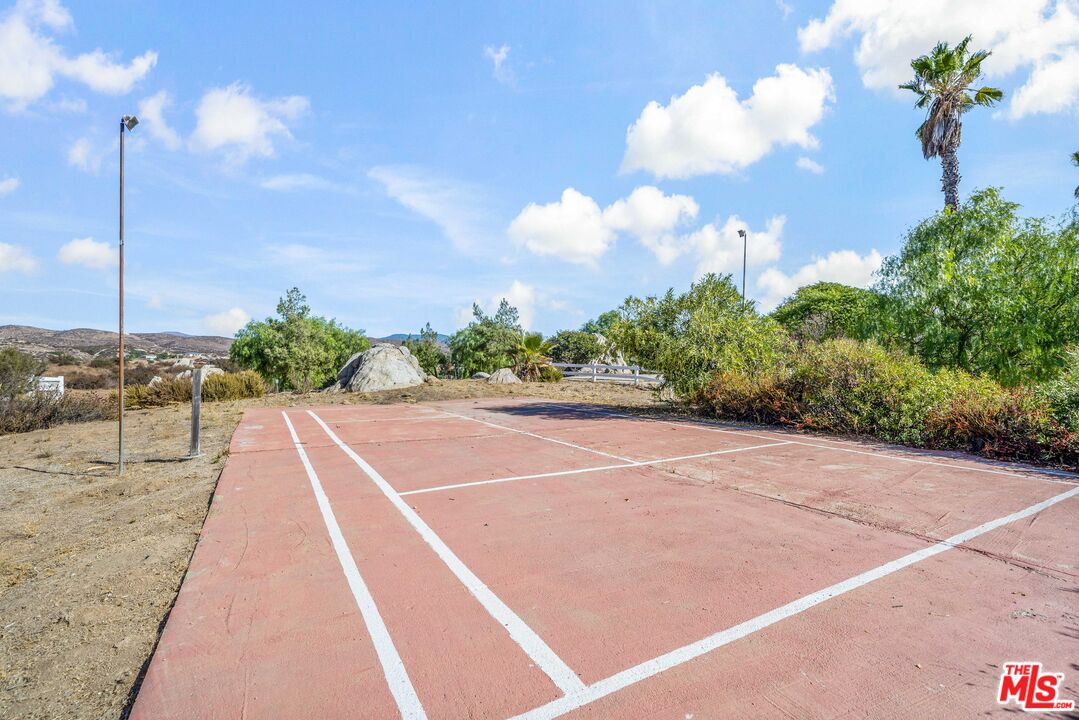 38675 Green Meadow Road Temecula, CA 92592 - Photo 33 of 74 a view of a tennis court