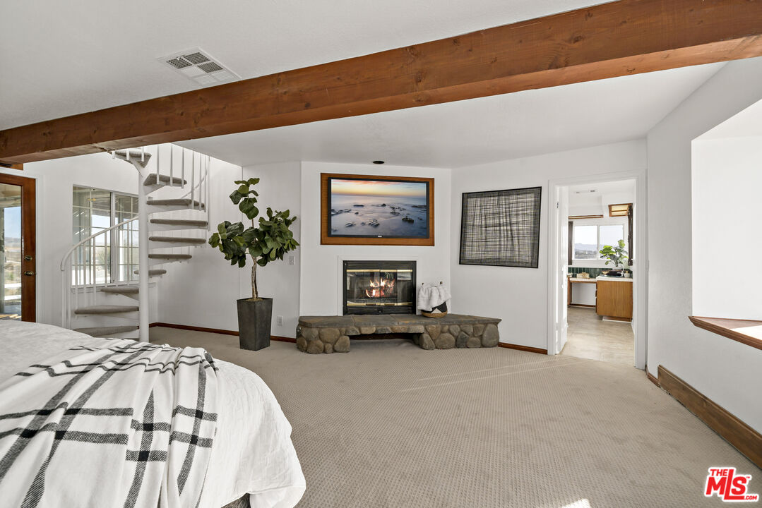 38675 Green Meadow Road Temecula, CA 92592 - Photo 59 of 74 a living room with furniture and a fireplace