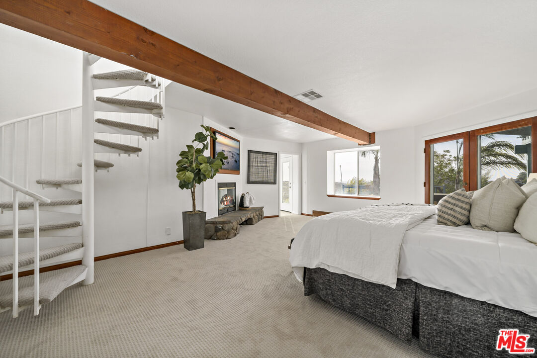38675 Green Meadow Road Temecula, CA 92592 - Photo 61 of 74 a bedroom with a bed and a large window
