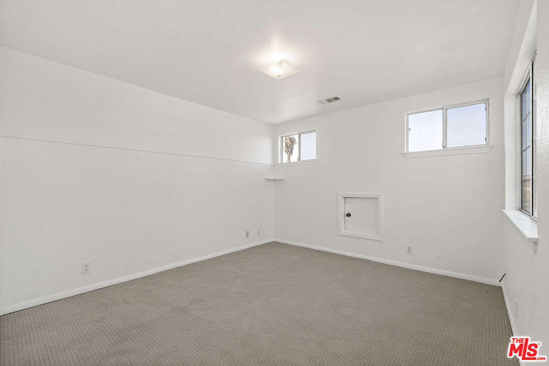 38675 Green Meadow Road Temecula, CA 92592 - Photo 68 of 74 a view of an empty room with a window