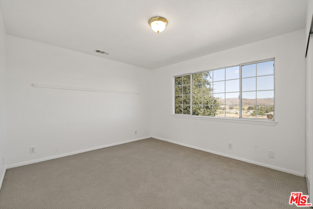 38675 Green Meadow Road Temecula, CA 92592 - Photo 74 of 74 an empty room with a window