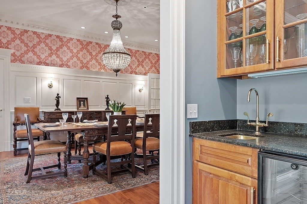 75 Oxbow Road Concord, MA 01742 - Photo 15 of 41 a view of a dining room with furniture window and wooden floor