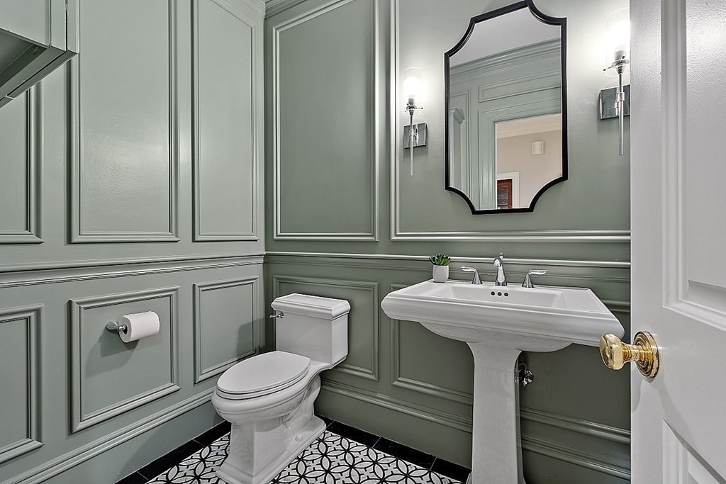 75 Oxbow Road Concord, MA 01742 - Photo 19 of 41 a bathroom with a toilet sink and mirror