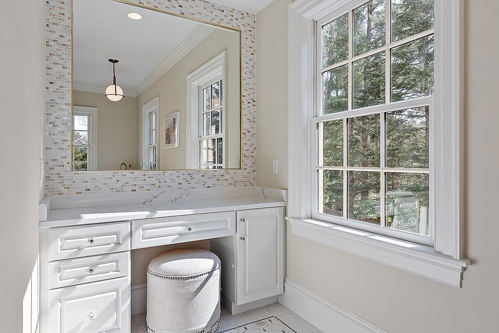 75 Oxbow Road Concord, MA 01742 - Photo 26 of 41 a bathroom with a toilet a sink and a mirror