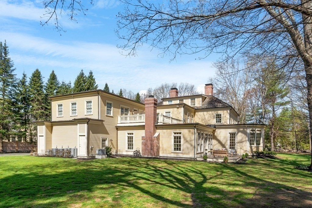 75 Oxbow Road Concord, MA 01742 - Photo 37 of 41 a view of a big building with a big yard