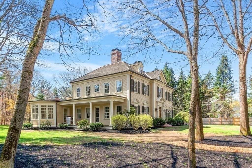 75 Oxbow Road Concord, MA 01742 - Photo 38 of 41 a front view of a house with a yard