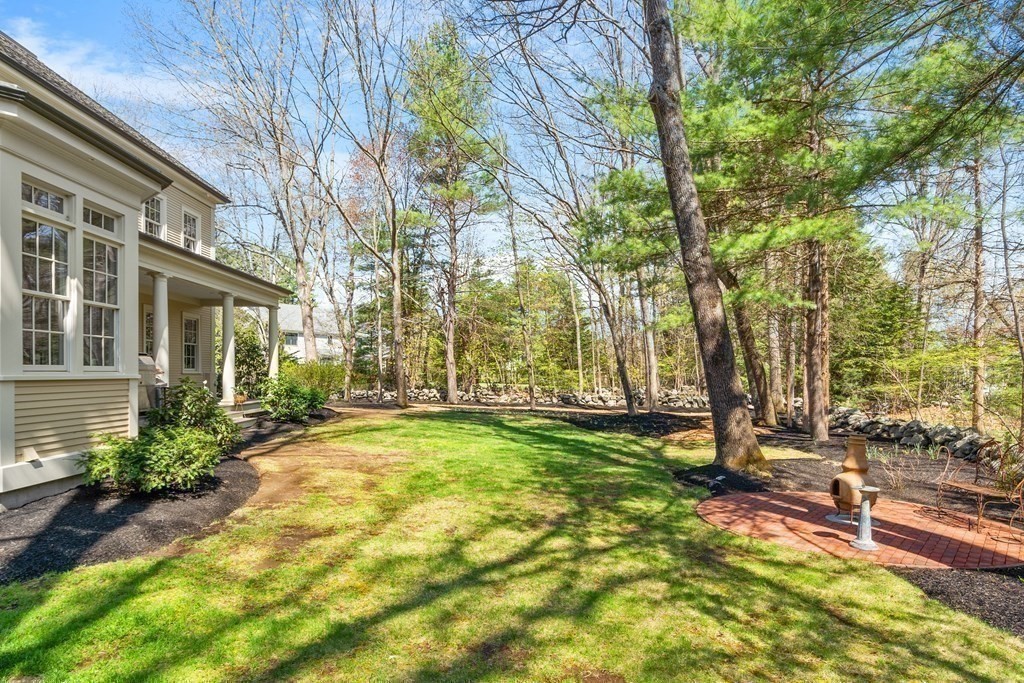 75 Oxbow Road Concord, MA 01742 - Photo 39 of 41 a view of a yard in front of a building