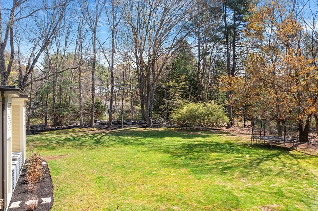 75 Oxbow Road Concord, MA 01742 - Photo 40 of 41 a view of a backyard with swimming pool