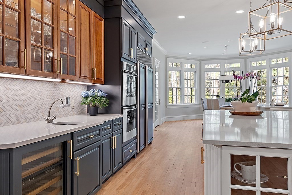 75 Oxbow Road Concord, MA 01742 - Photo 5 of 41 a kitchen with stainless steel appliances granite countertop a sink stove and cabinets