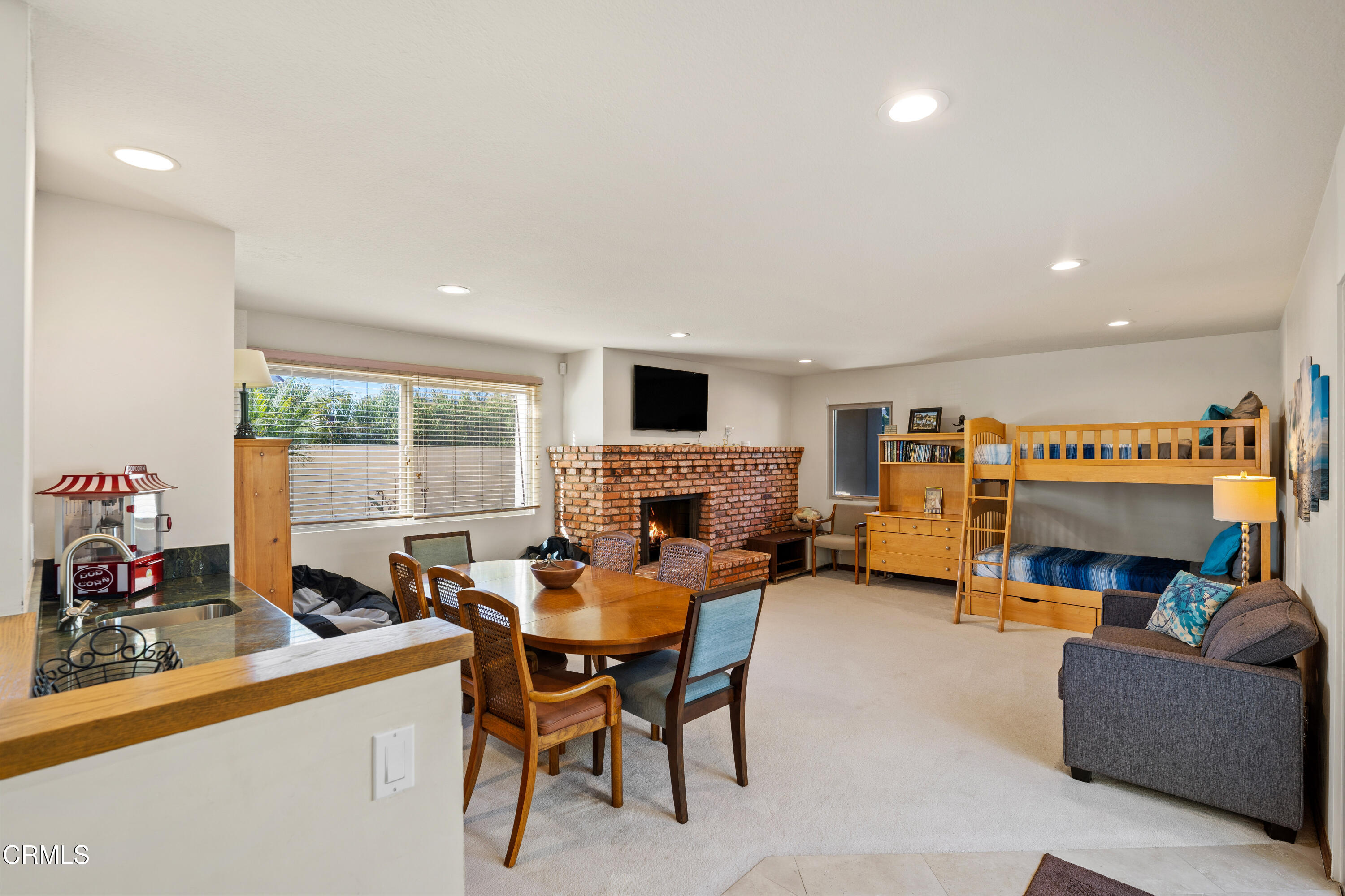 1150 Mandalay Beach Road Oxnard, CA 93035 - Photo 25 of 48 a living room with furniture and a flat screen tv