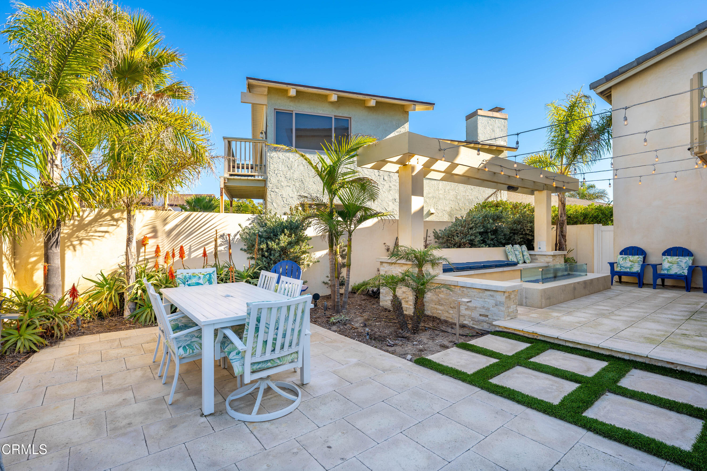 1150 Mandalay Beach Road Oxnard, CA 93035 - Photo 32 of 48 a view of a chairs and table in the patio