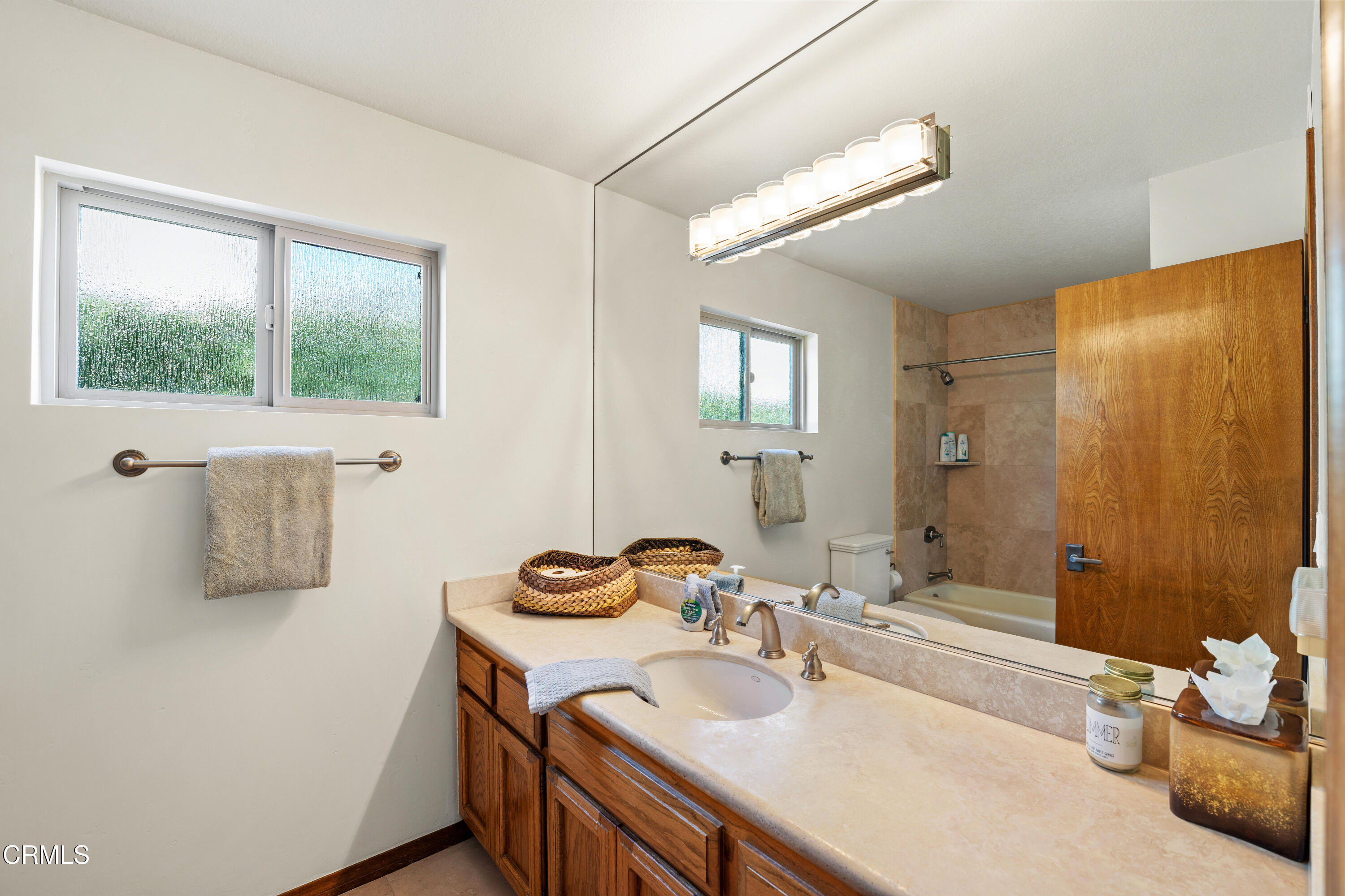 1150 Mandalay Beach Road Oxnard, CA 93035 - Photo 38 of 48 a bathroom with a sink and a mirror
