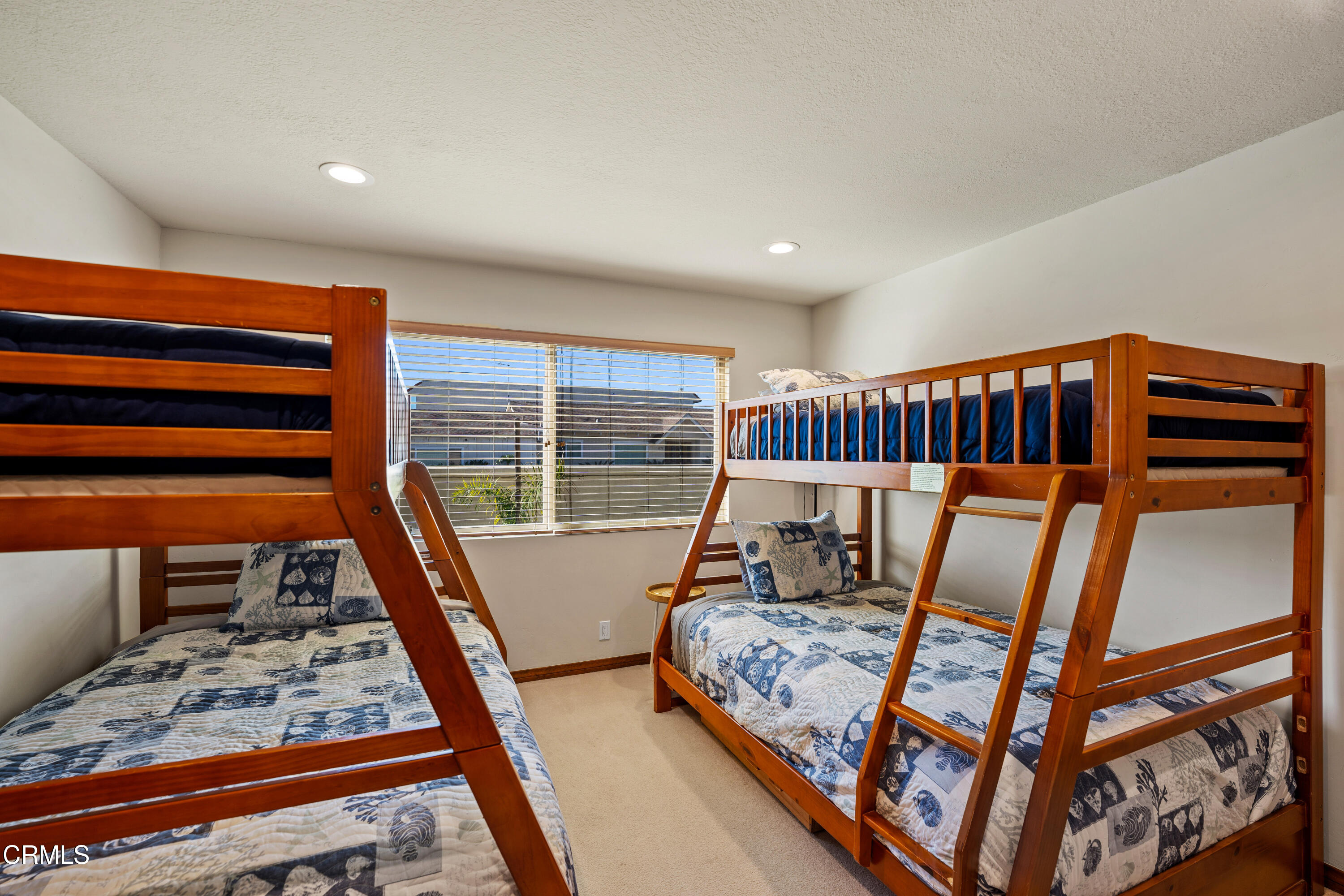 1150 Mandalay Beach Road Oxnard, CA 93035 - Photo 40 of 48 a bed room with furniture and a wooden floor