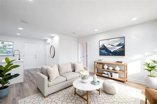 a living room with furniture and a couch