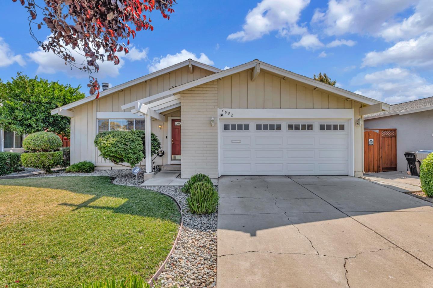 4692 Mia Circle San Jose, CA 95136 - Photo 1 of 42 a view of a house with backyard and garden
