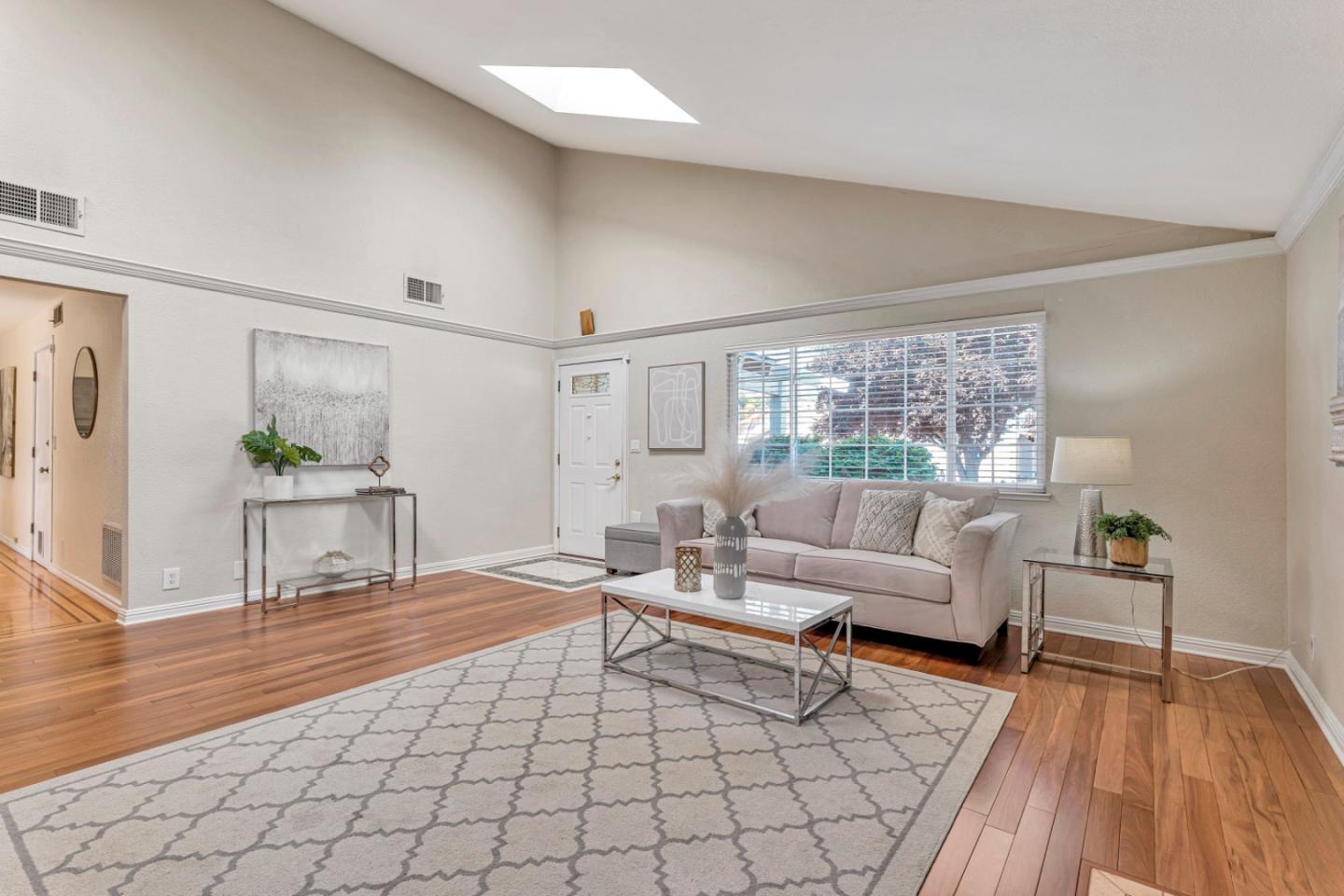 4692 Mia Circle San Jose, CA 95136 - Photo 11 of 42 a living room with furniture and a wooden floor