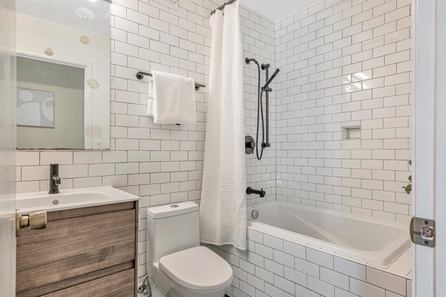 4692 Mia Circle San Jose, CA 95136 - Photo 30 of 42 a bathroom with a sink a toilet and bathtub