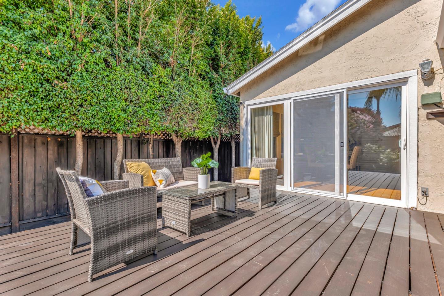 4692 Mia Circle San Jose, CA 95136 - Photo 38 of 42 a view of backyard with outdoor seating and wooden floor