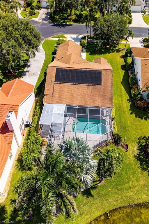 443 Dundee Court Naples, FL 34104 - Photo 12 of 39 an aerial view of a house with a yard basket ball court and outdoor seating