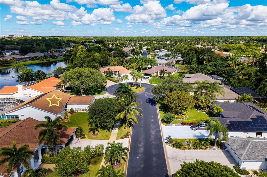 443 Dundee Court Naples, FL 34104 - Photo 38 of 39 an aerial view of a houses with outdoor space