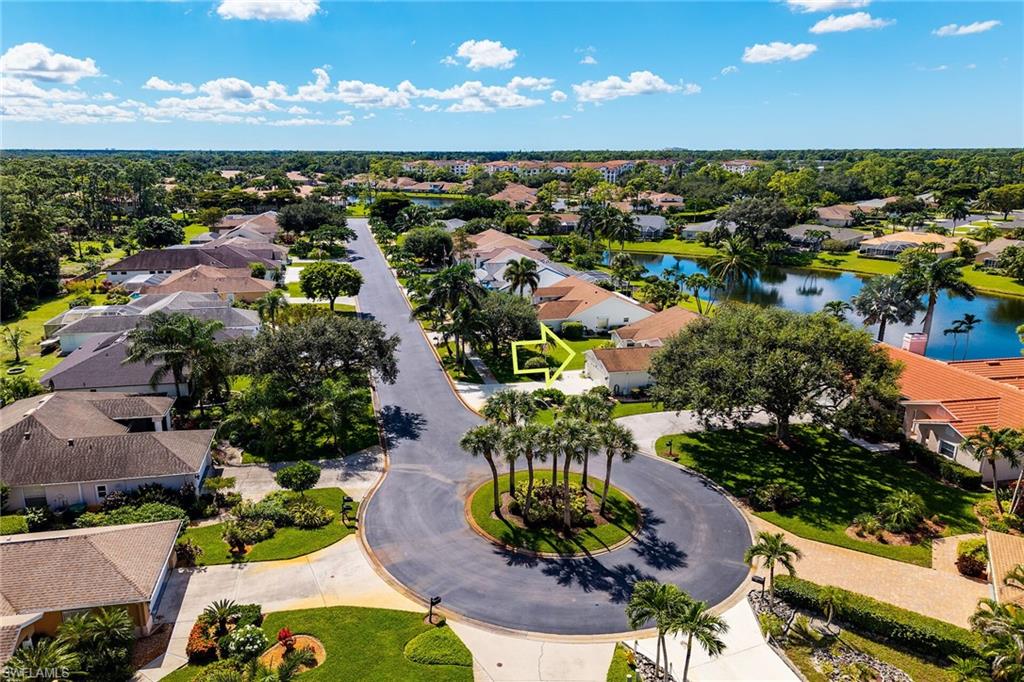 443 Dundee Court Naples, FL 34104 - Photo 10 of 39 an aerial view of residential houses with outdoor space
