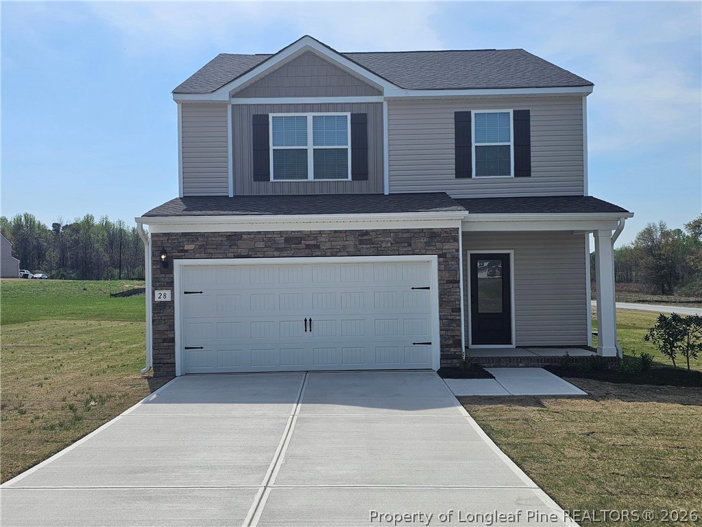 28 Rider Street Broadway, NC 27505 - Photo 1 of 22 front view of a house with a yard
